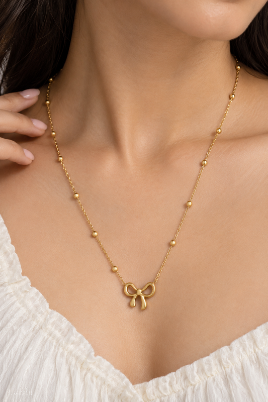 Minimalist Gold Ribbon Bow Necklace with Beaded Satellite Chain