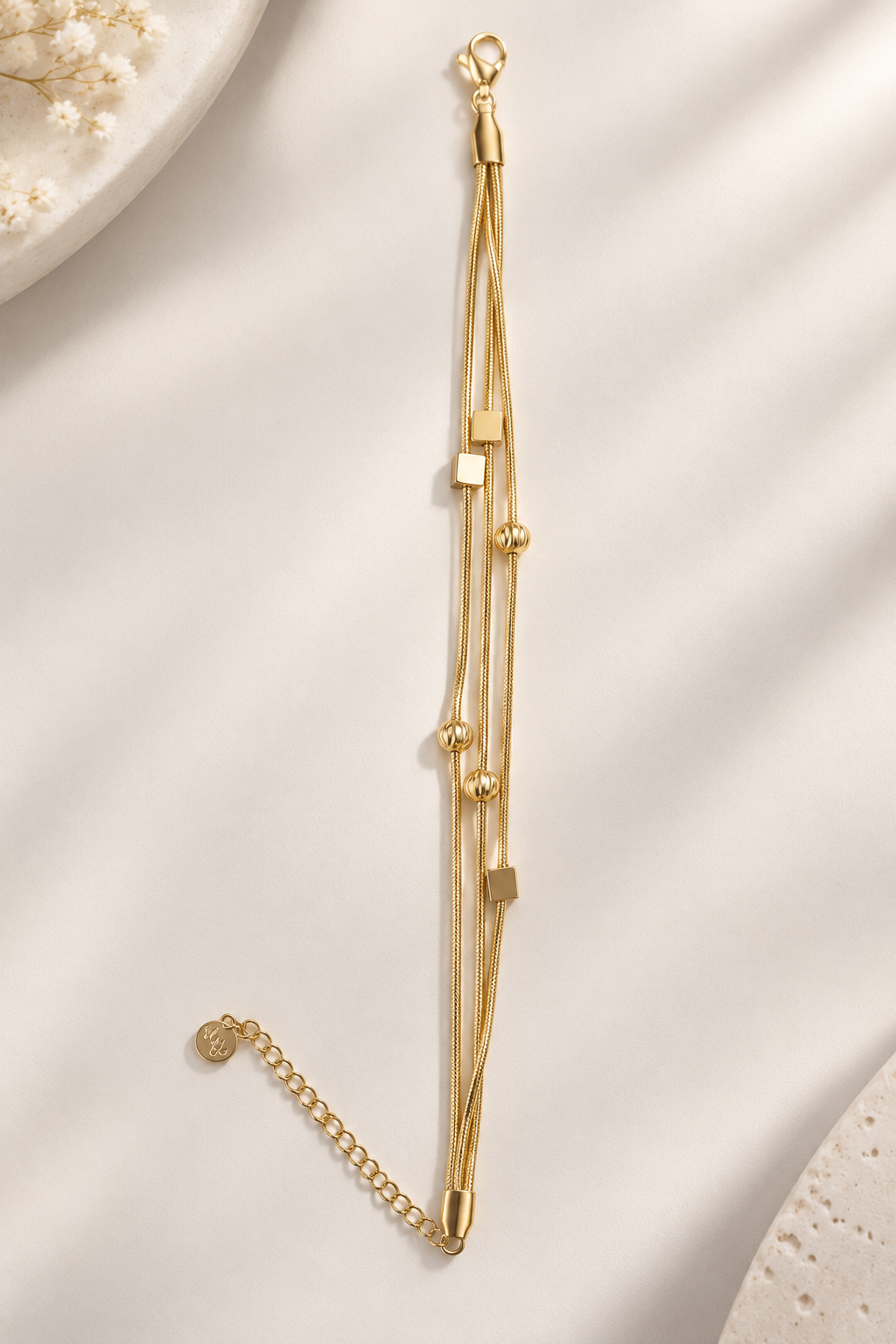 Triple-Strand Gold Bracelet with Beaded & Square Accents