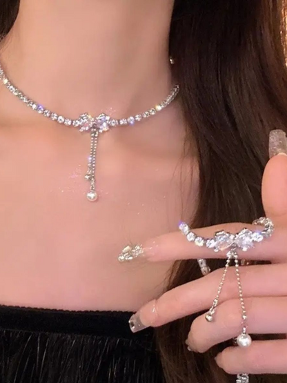 Shimmering Rhinestones Tassel Drop Bow Necklace