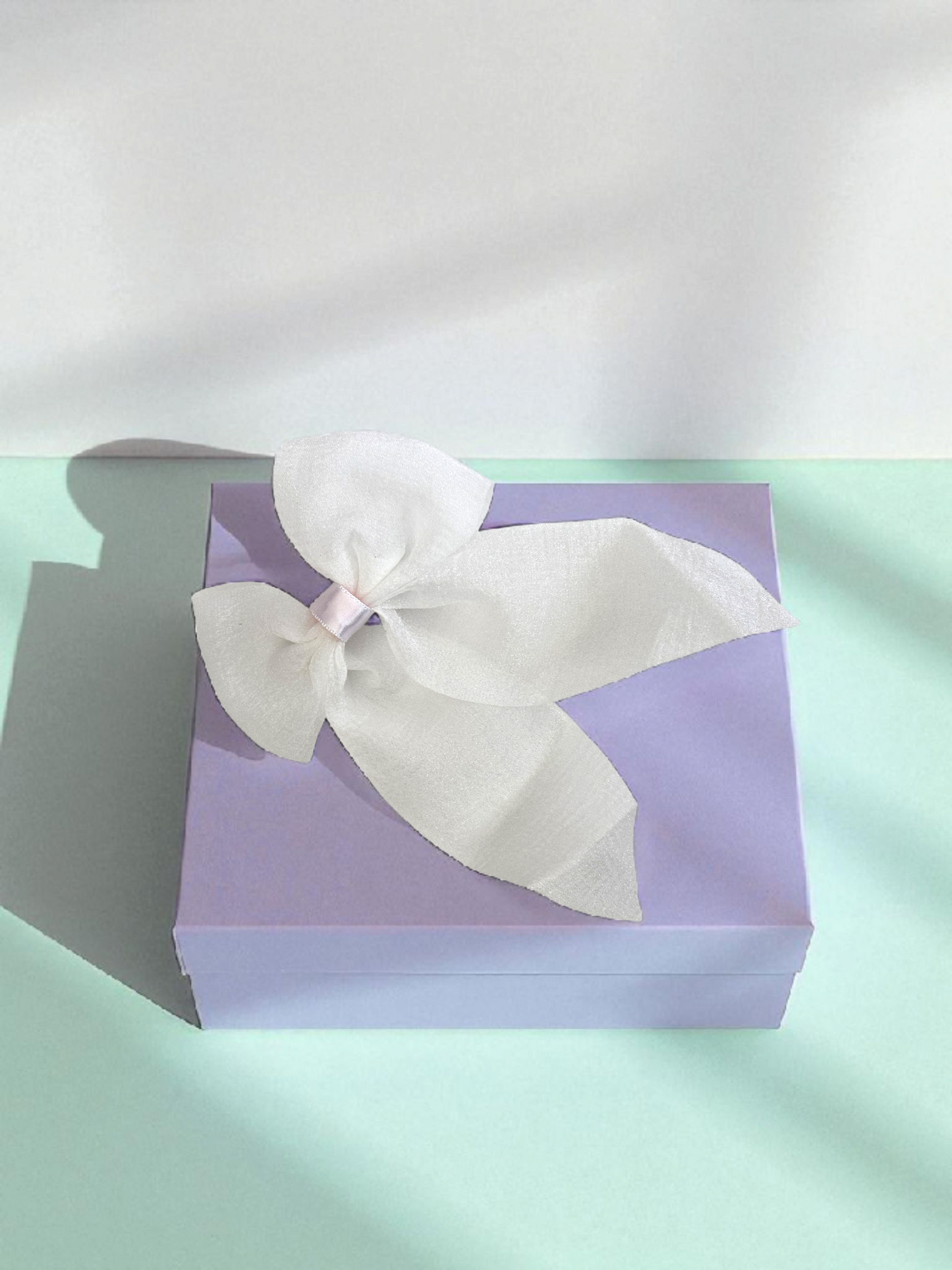 Dallae Bow Butterfly Hair Clip Made of White Sheer Chiffon Fabric