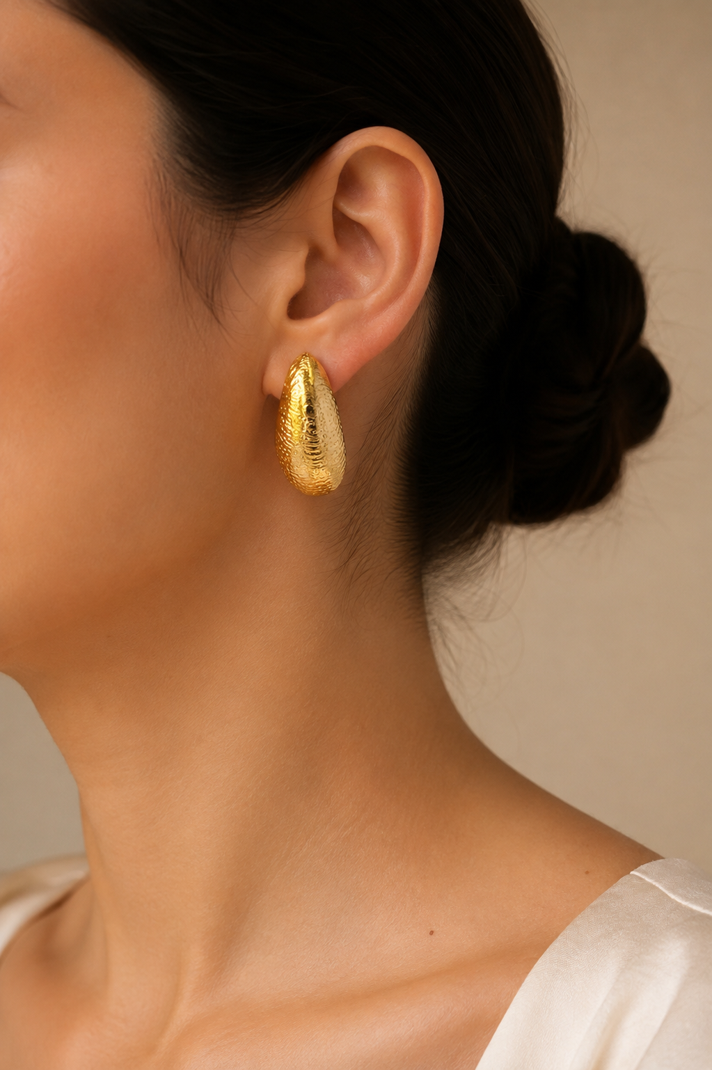 Solene Textured Hoop Earrings — the hammered, curved gold hoops