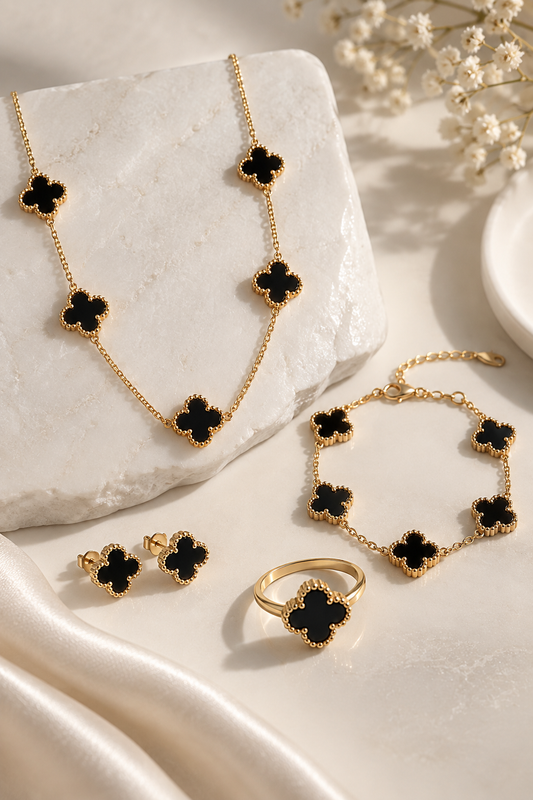 Clover Motif 4-Piece Jewelry Set: Black And Gold-Tone Necklace, Bracelet, Earrings, and Ring Combo