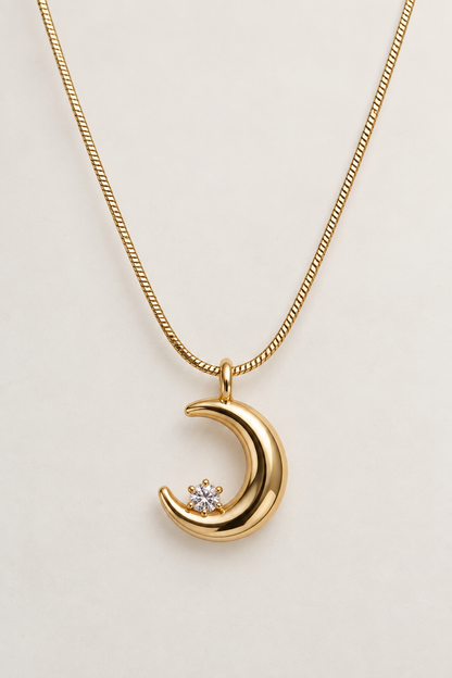The Orbital Crescent Pendant — Polished Gold Moon Necklace with Solitaire Accent